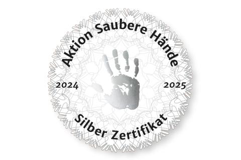 Silbernes Zertifikat 2024 der "Aktion Saubere Hände" – Siegel.